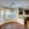 Dining room is next to bay windows