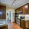 Kitchen is a galley kitchen with an overhead light