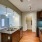 Kitchen has an island with bar seating